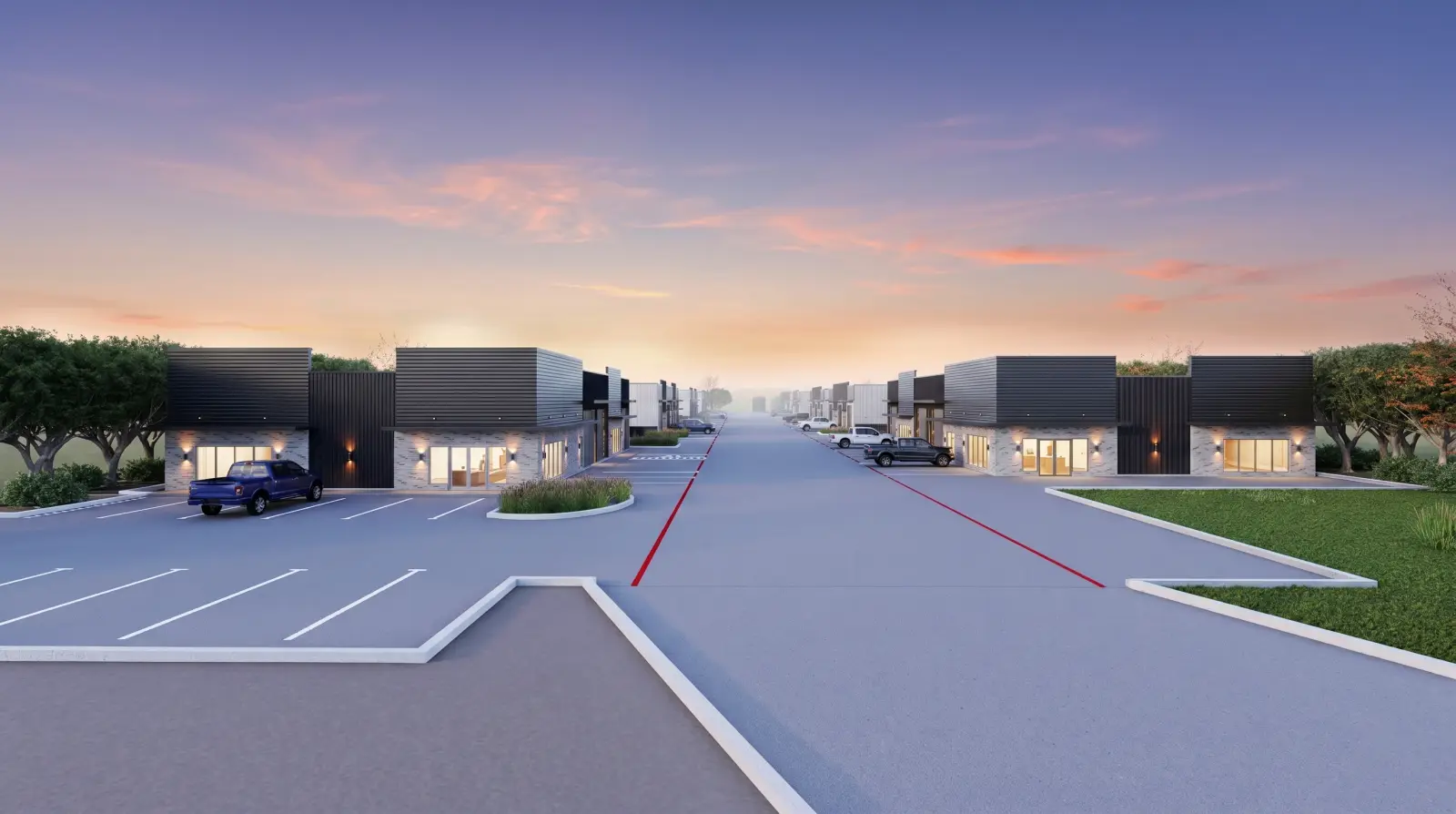 Small-bay flex buildings with grade-level doors and showroom fronts along N Goliad Street in Rockwall, Texas