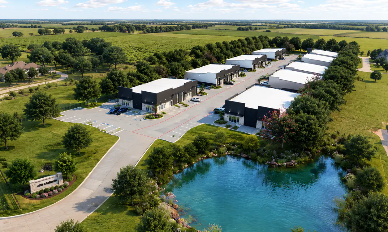 Aerial rendering of Rockwall Flex Park in Rockwall, Texas, showing rows of small-bay flex buildings along a central drive with a pond and open land around the site